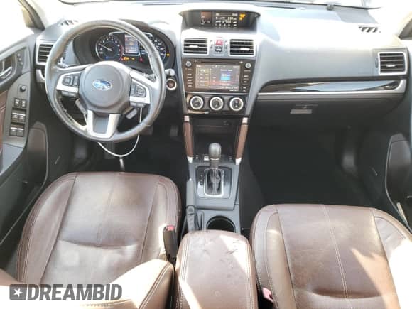 2017 Subaru Forester Touring z VIN JF2SJGWCXHH543032, wystawiony jako Copart lot #82477415 z przebiegiem 154 499 mil mil oraz Szkoda całkowita • Salvage title. Historia ofert i sprzedaży dostępna na DreamBid. Obrazek 8.