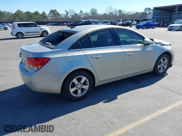 2014 Chevrolet Cruze 1LT with VIN 1G1PD5SBXE7300571, listed as a IAAI auction lot 41571549 with 71,981 mi miles and . Bid and sale history available at DreamBid. Image 4.