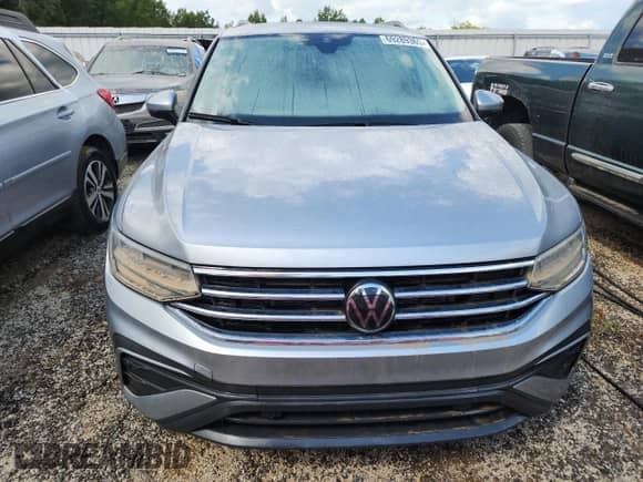 2024 Volkswagen Tiguan SE с VIN 3VVMB7AX8RM106112, выставлен на аукционе Copart как лот 69289365 с пробегом Не указан миль и На запчасти • Non repairable. История ставок и продаж доступна на DreamBid. Изображение 5.