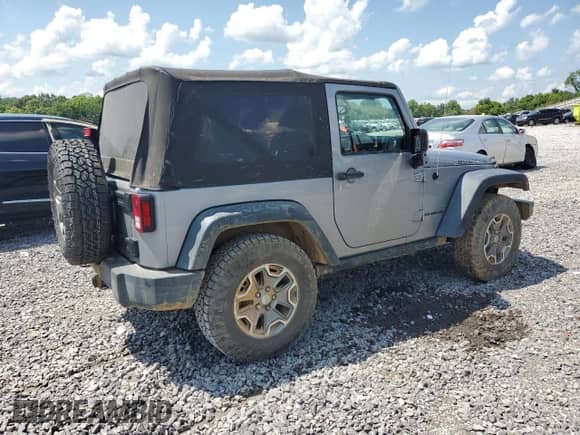 2016 Jeep Wrangler Rubicon with VIN 1C4BJWCG5GL100606, listed as a Copart auction lot 60307055 with 75,206 mi miles and Salvage title. Bid and sale history available at DreamBid. Image 3.