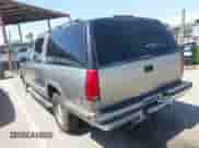 1999 Chevrolet Suburban z VIN 3GNEC16R0XG270822, wystawiony jako IAAI lot #42397271 z przebiegiem 242 250 mil mil oraz . Historia ofert i sprzedaży dostępna na DreamBid. Obrazek 3.