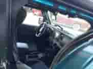 2020 Jeep Wrangler Sport S with VIN 1C4GJXAG1LW151849, listed as a IAAI auction lot 42513966 with 87,269 mi miles and . Bid and sale history available at DreamBid. Image 5.