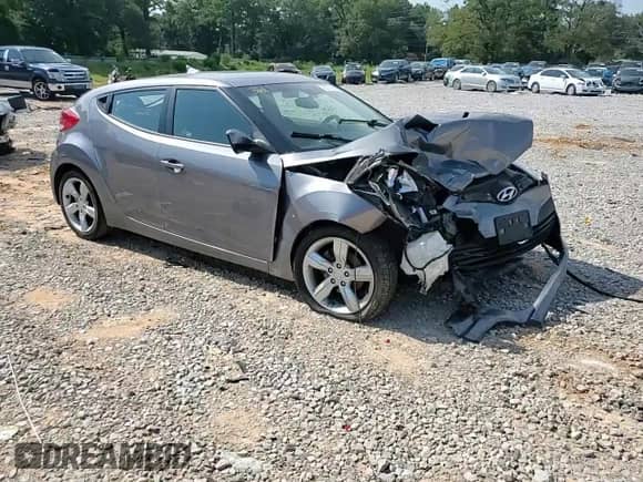 2012 Hyundai Veloster w/Black Int z VIN KMHTC6AD7CU028864, wystawiony jako Copart lot #66377895 z przebiegiem 130 440 mil mil oraz Szkoda całkowita • Salvage title. Historia ofert i sprzedaży dostępna na DreamBid. Obrazek 14.