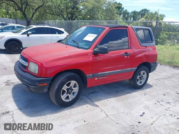 2002 Chevrolet Tracker with VIN 2CNBE18C926911755, listed as a IAAI auction lot 42452154 with 129,098 mi miles and . Bid and sale history available at DreamBid. Image 2.