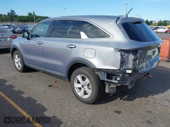 2023 Kia Sorento LX with VIN 5XYRGDLC7PG168609, listed as a IAAI auction lot 42893738 with 32,559 mi miles and . Bid and sale history available at DreamBid. Image 3.