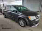 2015 Dodge Grand Caravan American Value with VIN 2C4RDGBG1FR691326, listed as a Copart auction lot 89787175 with 219,465 mi miles and Clean title. Bid and sale history available at DreamBid. Image 4.