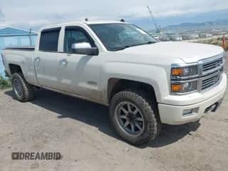 2014 Chevrolet Silverado 1500 High Country with VIN 3GCUKTEJXEG548539, listed as a IAAI auction lot 42458922 with 132,095 mi miles and . Bid and sale history available at DreamBid. Image 1.