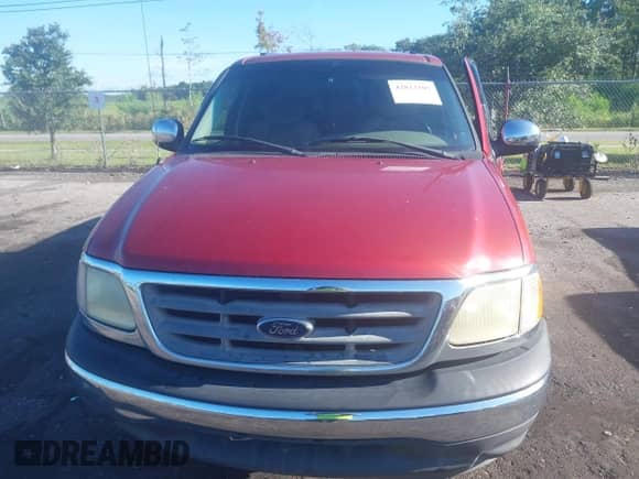 2002 Ford F-150 XLT с VIN 1FTRW07LX2KD47266, выставлен на аукционе IAAI как лот 42823107 с пробегом 183 796 миль миль и . История ставок и продаж доступна на DreamBid. Изображение 12.
