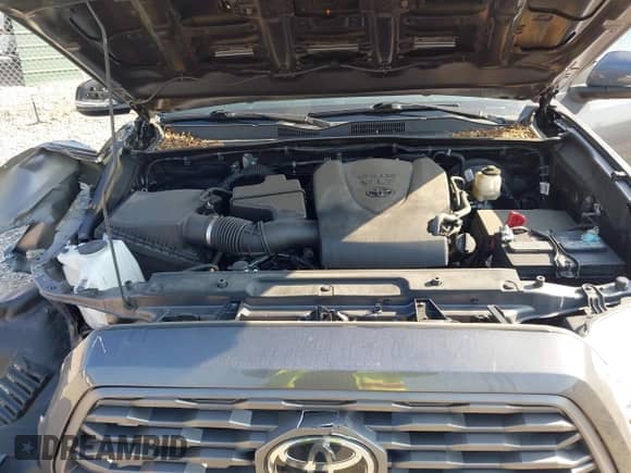 2021 Toyota Tacoma SR with VIN 3TYCZ5AN0MT027247, listed as a IAAI auction lot 43234020 with 26,058 mi miles and . Bid and sale history available at DreamBid. Image 10.
