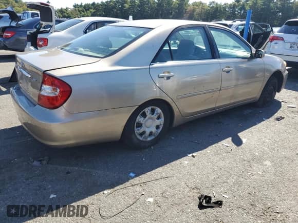 2003 Toyota Camry LE z VIN 4T1BE32K73U233201, wystawiony jako Copart lot #84635075 z przebiegiem 279 555 mil mil oraz Czysty tytuł • Clean title. Historia ofert i sprzedaży dostępna na DreamBid. Obrazek 3.