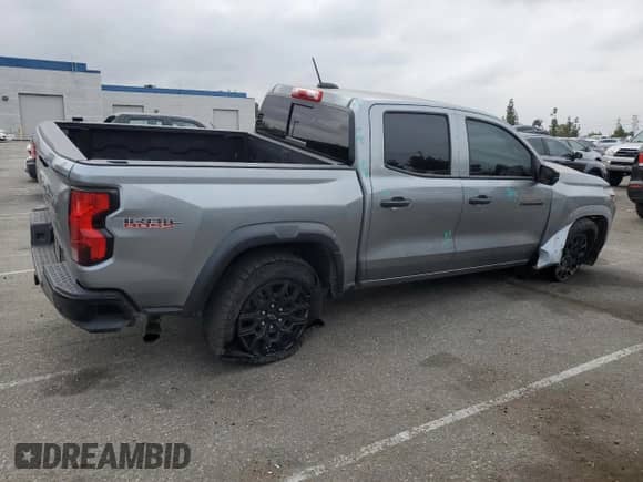2023 Chevrolet Colorado 4WD Trail Boss z VIN 1GCPTEEK3P1197621, wystawiony jako Copart lot #65346155 z przebiegiem 41 432 mil mil oraz Szkoda całkowita • Salvage title. Historia ofert i sprzedaży dostępna na DreamBid. Obrazek 3.