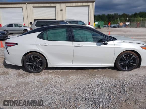 2020 Toyota Camry XSE z VIN 4T1K61AK6LU367572, wystawiony jako IAAI lot #43415552 z przebiegiem 99 436 mil mil oraz . Historia ofert i sprzedaży dostępna na DreamBid. Obrazek 13.