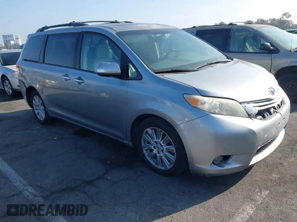2013 Toyota Sienna XLE AAS with VIN 5TDYK3DC0DS360388, listed as a IAAI auction lot 41163681 with 146,920 mi miles and . Bid and sale history available at DreamBid. Image 1.