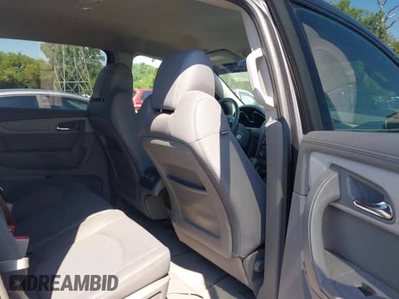 2015 Chevrolet Traverse LS z VIN 1GNKVFKD8FJ241991, wystawiony jako IAAI lot #42627615 z przebiegiem 138 539 mil mil oraz . Historia ofert i sprzedaży dostępna na DreamBid. Obrazek 8.