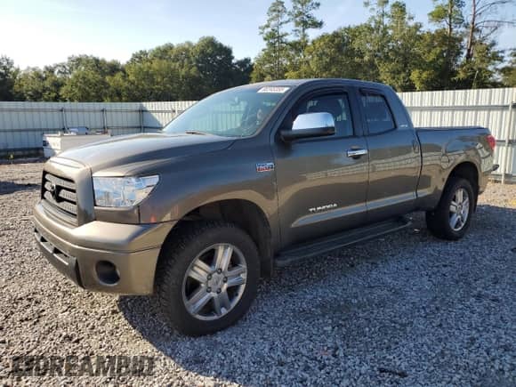 2007 Toyota Tundra Limited с VIN 5TBBV581X7S465079, выставлен на аукционе Copart как лот 80245355 с пробегом 203 592 миль миль и Списание • Salvage title. История ставок и продаж доступна на DreamBid. Изображение 1.