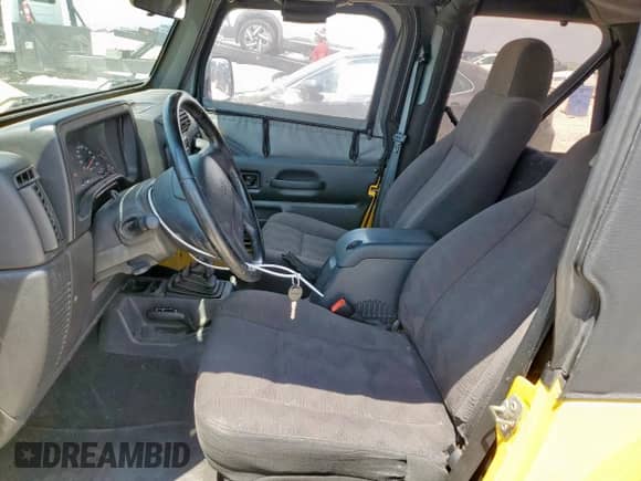 2003 Jeep Wrangler X z VIN 1J4FA39S53P377104, wystawiony jako Copart lot #69841665 z przebiegiem 131 839 mil mil oraz Szkoda całkowita • Salvage title. Historia ofert i sprzedaży dostępna na DreamBid. Obrazek 7.