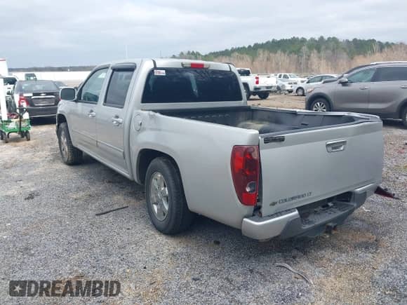 2010 Chevrolet Colorado 1LT z VIN 1GCDSCDE7A8143405, wystawiony jako IAAI lot #41578223 z przebiegiem 158 886 mil mil oraz . Historia ofert i sprzedaży dostępna na DreamBid. Obrazek 3.
