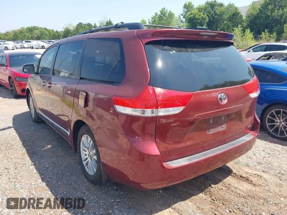 2013 Toyota Sienna XLE AAS with VIN 5TDYK3DC6DS329842, listed as a IAAI auction lot 42919969 with 197,459 mi miles and . Bid and sale history available at DreamBid. Image 3.