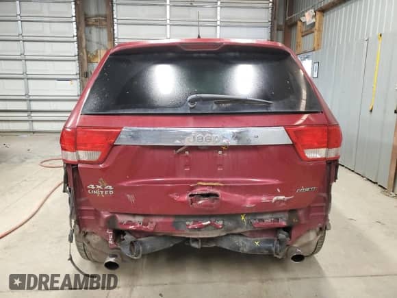 2012 Jeep Grand Cherokee Limited z VIN 1C4RJFBT9CC325666, wystawiony jako Copart lot #85650175 z przebiegiem 158 571 mil mil oraz Szkoda całkowita • Salvage title. Historia ofert i sprzedaży dostępna na DreamBid. Obrazek 6.