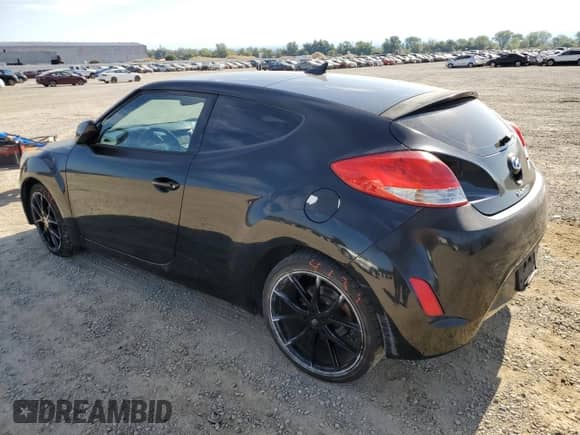 2013 Hyundai Veloster w/Black Int с VIN KMHTC6ADXDU159174, выставлен на аукционе Copart как лот 67471915 с пробегом 146 394 миль миль и Списание • Salvage title. История ставок и продаж доступна на DreamBid. Изображение 2.