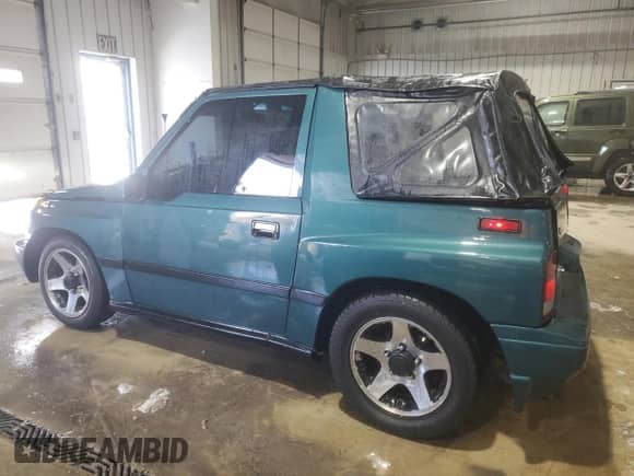 1996 Chevrolet Tracker с VIN 2CNBJ1869T6903842, выставлен на аукционе Copart как лот 87734315 с пробегом 120 835 миль миль и Списание • Salvage title. История ставок и продаж доступна на DreamBid. Изображение 2.