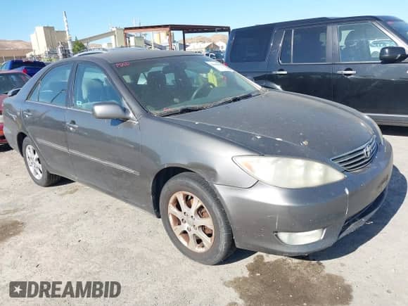 2006 Toyota Camry STD with VIN 4T1BE30K06U656063, listed as a IAAI auction lot 42386998 with 291,975 mi miles and . Bid and sale history available at DreamBid. Image 1.