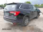 2020 Honda Pilot EX-L z VIN 5FNYF6H57LB059332, wystawiony jako IAAI lot #42614422 z przebiegiem 110 279 mil mil oraz . Historia ofert i sprzedaży dostępna na DreamBid. Obrazek 4.