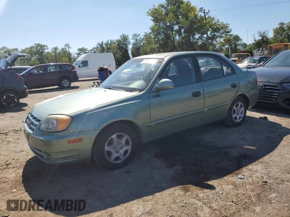 2004 Hyundai Accent GL z VIN KMHCG45C24U503929, wystawiony jako Copart lot #71820915 z przebiegiem 146 643 mil mil oraz Szkoda całkowita • Salvage title. Historia ofert i sprzedaży dostępna na DreamBid. Obrazek 1.