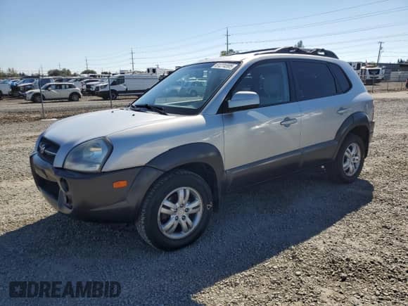 2007 Hyundai Tucson SE with VIN KM8JN12D67U636867, listed as a Copart auction lot 81274595 with 146,074 mi miles and Salvage title. Bid and sale history available at DreamBid. Image 1.
