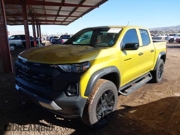 2023 Chevrolet Colorado 4WD Trail Boss with VIN 1GCPTEEK9P1148584, listed as a IAAI auction lot 41487552 with 19,468 mi miles and . Bid and sale history available at DreamBid. Image 2.