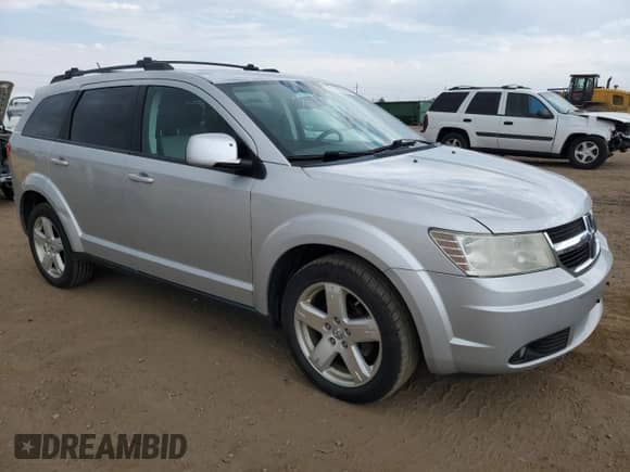 2009 Dodge Journey SXT with VIN 3D4GH57V79T146842, listed as a Copart auction lot 70131805 with 170,455 mi miles and Clean title. Bid and sale history available at DreamBid. Image 4.