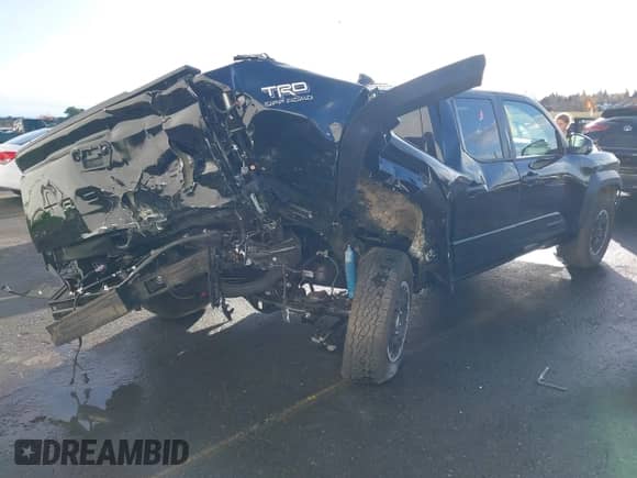 2024 Toyota Tacoma SR5 with VIN 3TMLB5JNXRM049327, listed as a IAAI auction lot 40906568 with 691 mi miles and . Bid and sale history available at DreamBid. Image 6.