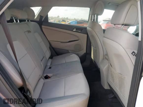 2018 Hyundai Tucson SE с VIN KM8J23A47JU810328, выставлен на аукционе Copart как лот 71086075 с пробегом 119 739 миль миль и Списание • Salvage title. История ставок и продаж доступна на DreamBid. Изображение 11.