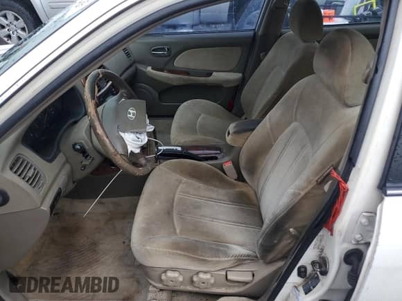 2002 Hyundai Sonata GLS z VIN KMHWF35H32A652192, wystawiony jako Copart lot #85077495 z przebiegiem 213 398 mil mil oraz Szkoda całkowita • Salvage title. Historia ofert i sprzedaży dostępna na DreamBid. Obrazek 7.