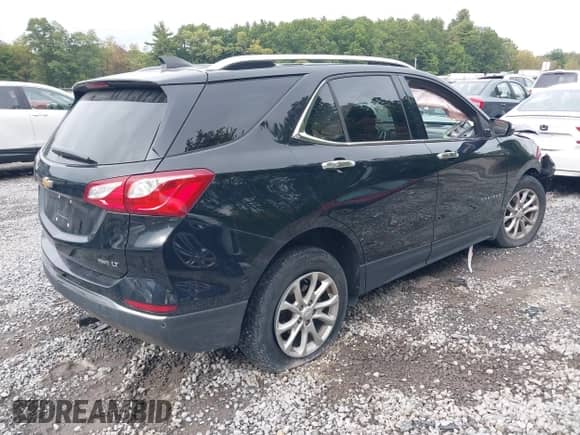 2018 Chevrolet Equinox LT with VIN 2GNAXSEV1J6248922, listed as a IAAI auction lot 43279402 with 81,088 mi miles and . Bid and sale history available at DreamBid. Image 4.