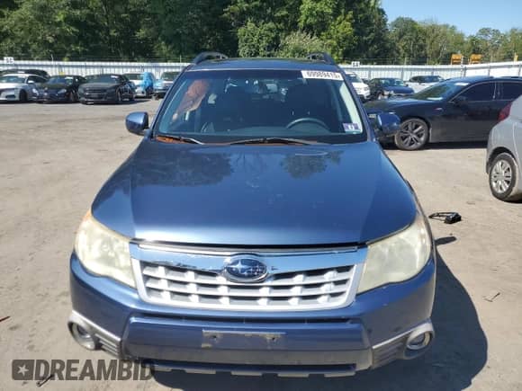 2011 Subaru Forester X Limited z VIN JF2SHAFC3BH773091, wystawiony jako Copart lot #69989415 z przebiegiem 148 987 mil mil oraz Szkoda całkowita • Salvage title. Historia ofert i sprzedaży dostępna na DreamBid. Obrazek 5.