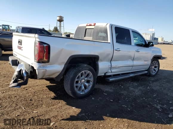 2017 GMC Sierra 1500 SLT with VIN 3GTU2NEC4HG155458, listed as a Copart auction lot 85938935 with 102,496 mi miles and Salvage title. Bid and sale history available at DreamBid. Image 3.
