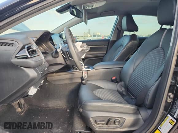 2023 Toyota Camry Hybrid SE with VIN 4T1T31AK4PU047945, listed as a Copart auction lot 86823265 with 58,221 mi miles and Salvage title. Bid and sale history available at DreamBid. Image 7.