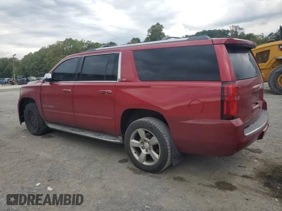 2015 Chevrolet Suburban LTZ с VIN 1GNSKKKC1FR137921, выставлен на аукционе Copart как лот 70644505 с пробегом 218 182 миль миль и Списание • Salvage title. История ставок и продаж доступна на DreamBid. Изображение 2.