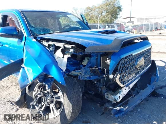 2018 Toyota Tacoma SR z VIN 3TMCZ5AN6JM157248, wystawiony jako IAAI lot #43500126 z przebiegiem 91 765 mil mil oraz . Historia ofert i sprzedaży dostępna na DreamBid. Obrazek 6.