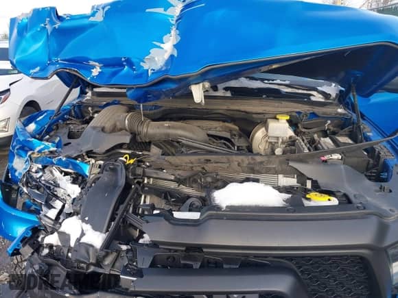 2022 Ram 1500 Rebel z VIN 1C6SRFLT0NN177124, wystawiony jako IAAI lot #41575076 z przebiegiem 40 065 mil mil oraz . Historia ofert i sprzedaży dostępna na DreamBid. Obrazek 10.