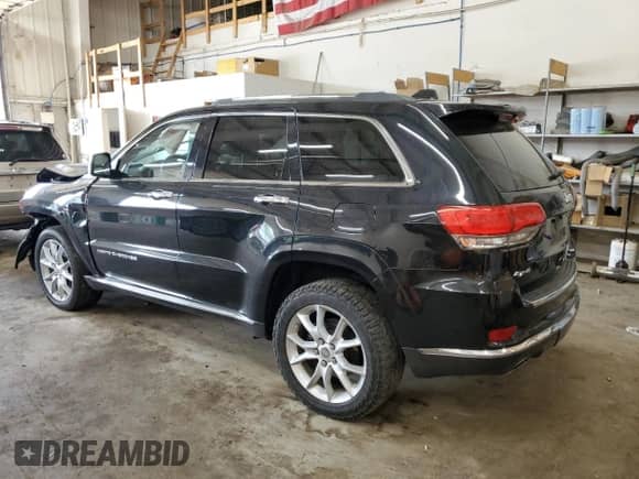 2014 Jeep Grand Cherokee Summit with VIN 1C4RJFJT8EC500512, listed as a Copart auction lot 67991355 with 127,729 mi miles and Non repairable. Bid and sale history available at DreamBid. Image 2.