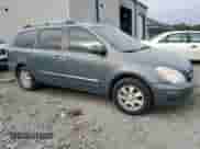 2007 Hyundai Entourage GLS with VIN KNDMC233676034624, listed as a Copart auction lot 77761734 with 215,206 mi miles and Salvage title. Bid and sale history available at DreamBid. Image 4.