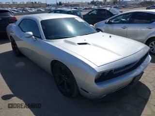 2012 Dodge Challenger R/T with VIN 2C3CDYBT6CH144809, listed as a IAAI auction lot 41958418 with 107,038 mi miles and . Bid and sale history available at DreamBid. Image 1.