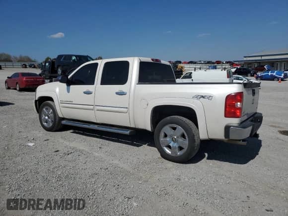 2009 Chevrolet Silverado 1500 LTZ with VIN 3GCEK33M69G249203, listed as a Copart auction lot 80805045 with 156,964 mi miles and Salvage title. Bid and sale history available at DreamBid. Image 2.