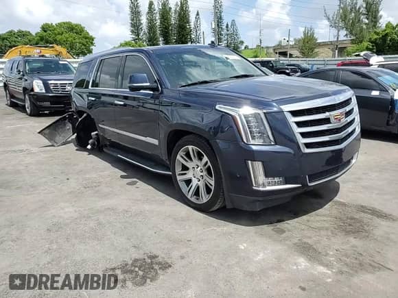 2018 Cadillac Escalade Luxury with VIN 1GYS3BKJ7JR260064, listed as a Copart auction lot 61089915 with 112,720 mi miles and Salvage title. Bid and sale history available at DreamBid. Image 14.