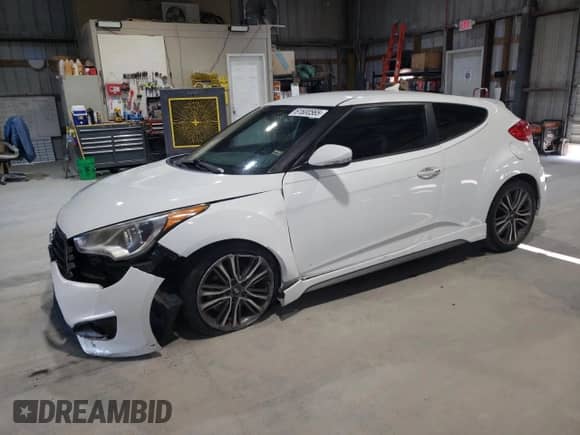 2016 Hyundai Veloster Turbo с VIN KMHTC6AE7GU283559, выставлен на аукционе Copart как лот 61600565 с пробегом Не указан миль и Списание • Salvage title. История ставок и продаж доступна на DreamBid. Изображение 1.