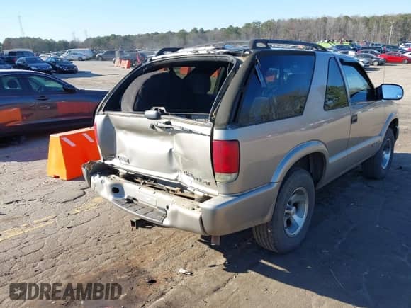 2002 Chevrolet Blazer LS с VIN 1GNCS18W12K145228, выставлен на аукционе IAAI как лот 41653692 с пробегом 213 764 миль миль и . История ставок и продаж доступна на DreamBid. Изображение 4.