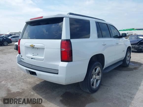 2017 Chevrolet Tahoe LS with VIN 1GNSCAKC3HR219434, listed as a IAAI auction lot 41911513 with 164,967 mi miles and . Bid and sale history available at DreamBid. Image 4.