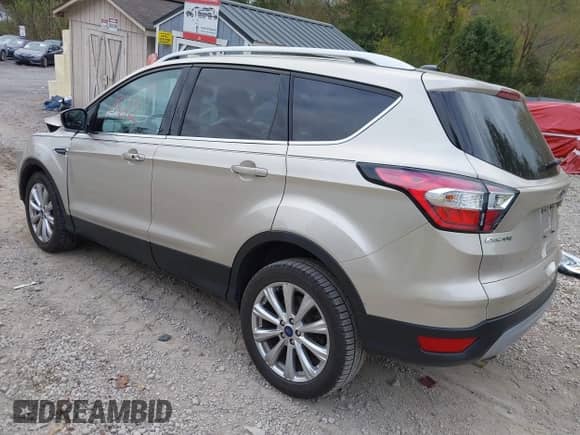 2017 Ford Escape Titanium with VIN 1FMCU9JD0HUC89677, listed as a IAAI auction lot 43418612 with 30,638 mi miles and . Bid and sale history available at DreamBid. Image 3.